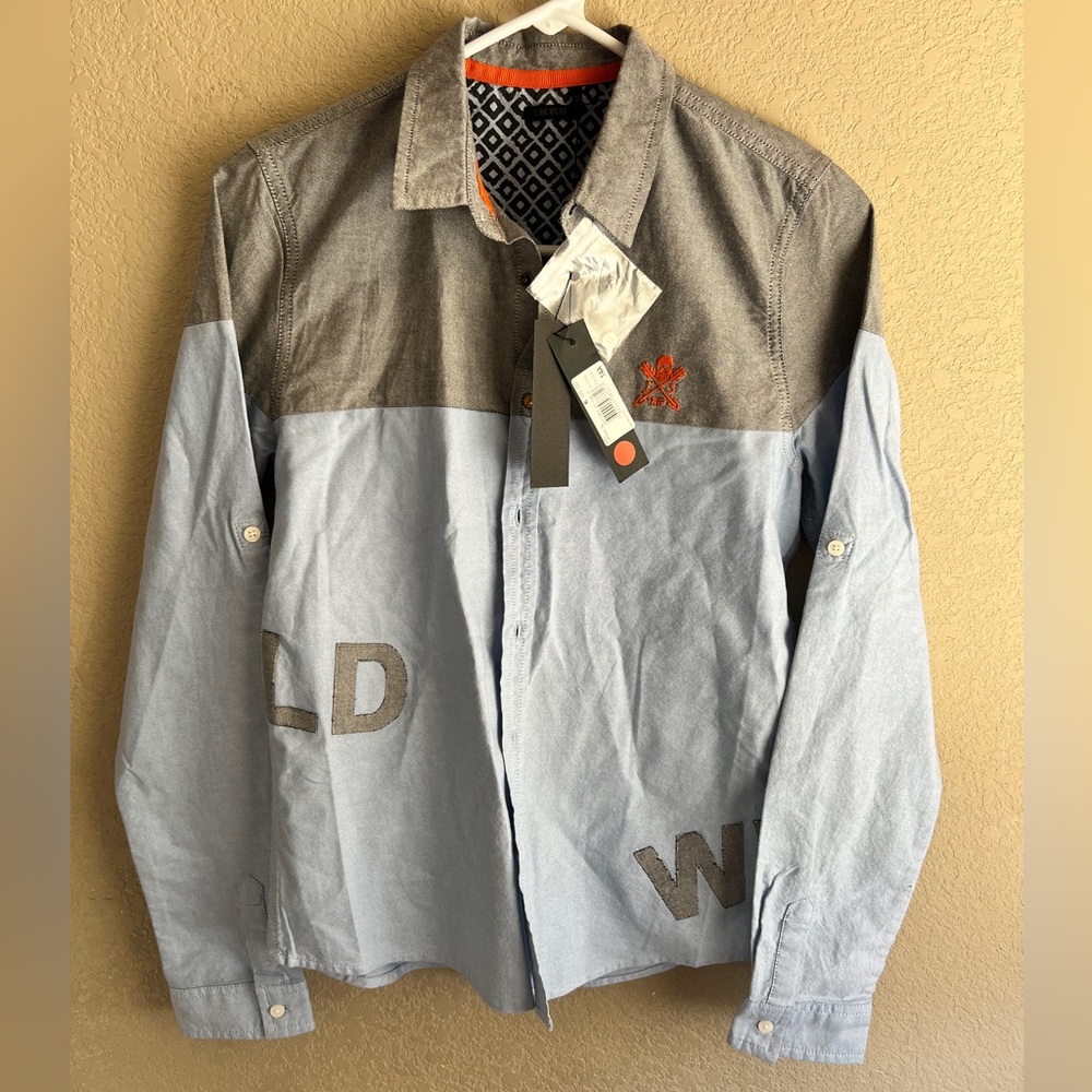 Button down shirt for boys by IKKS. Brand new.